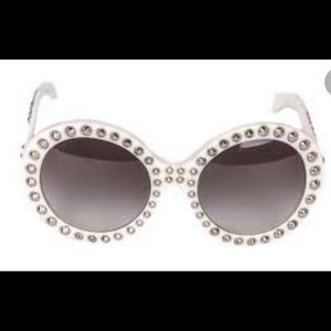 Used Prada SP29Q sunglasses with studs..please review pictures before purchase.